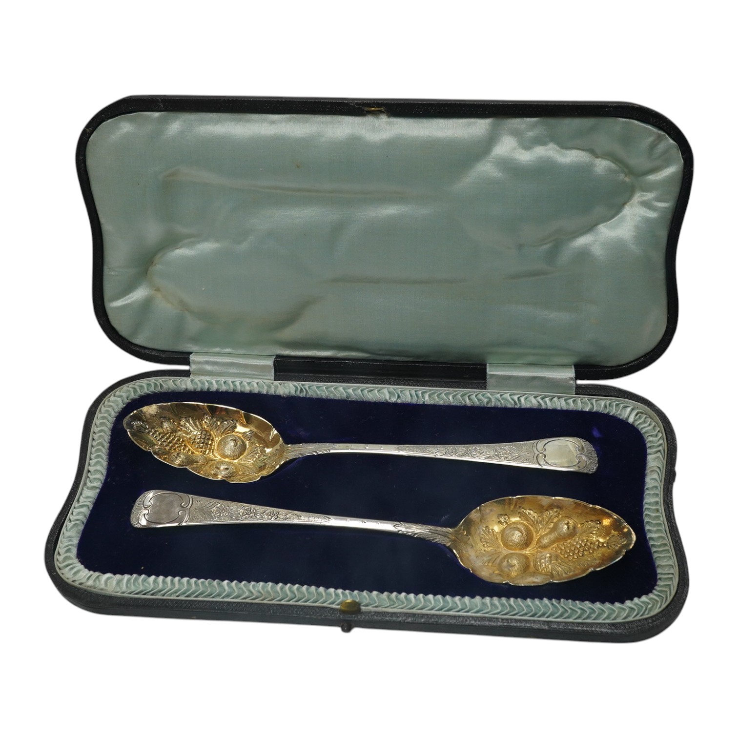 A cased pair of George III silver Old English pattern 'berry' spoons, by Joseph Ash I, London, 1810, 21.2cm, 2.9oz. Condition - fair to good